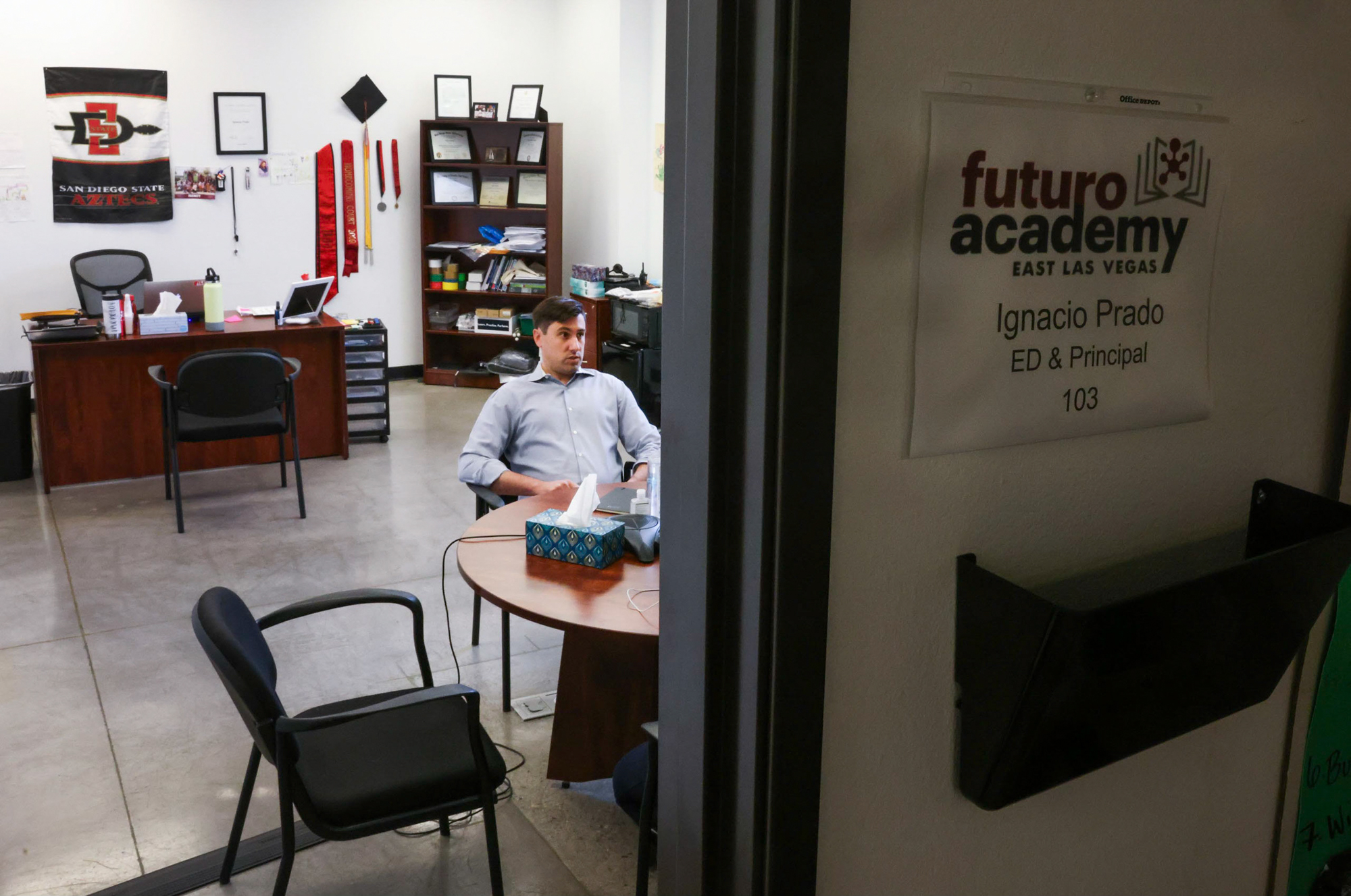 Ignacio Pradoon, executive director and principal at Futuro Academy charter school, sits in his office.